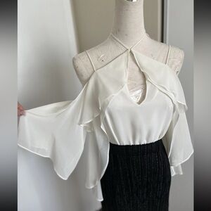 NWOT Bebe chiffon asymmetrical blouse size 2